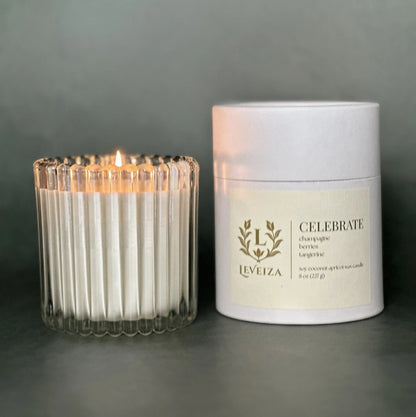 Celebrate luxury soy candle with white tube packaging by Leveiza