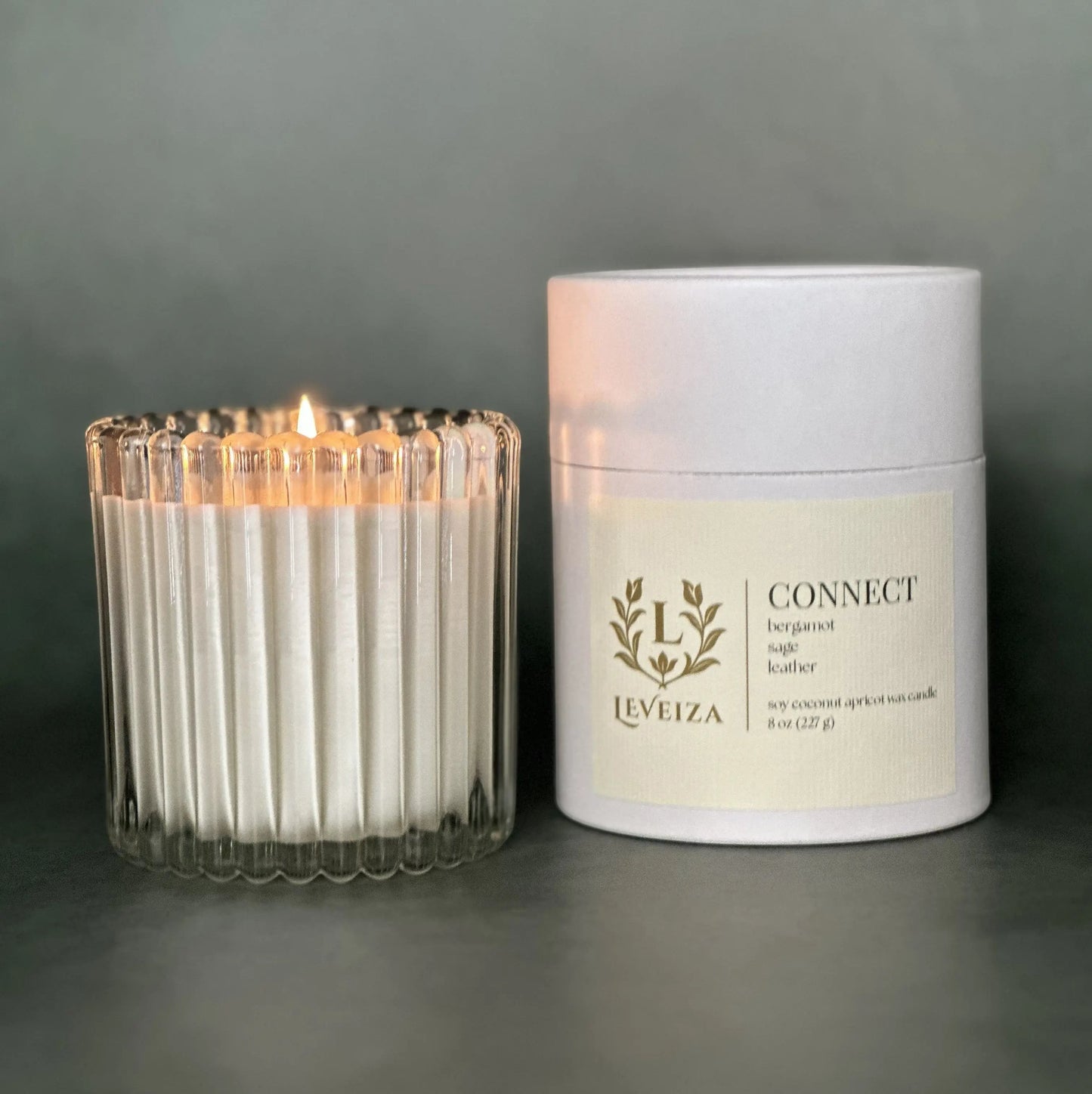 Connect luxury soy candle with white tube packaging by Leveiza