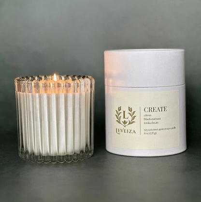 Create luxury soy candle with white tube packaging by Leveiza