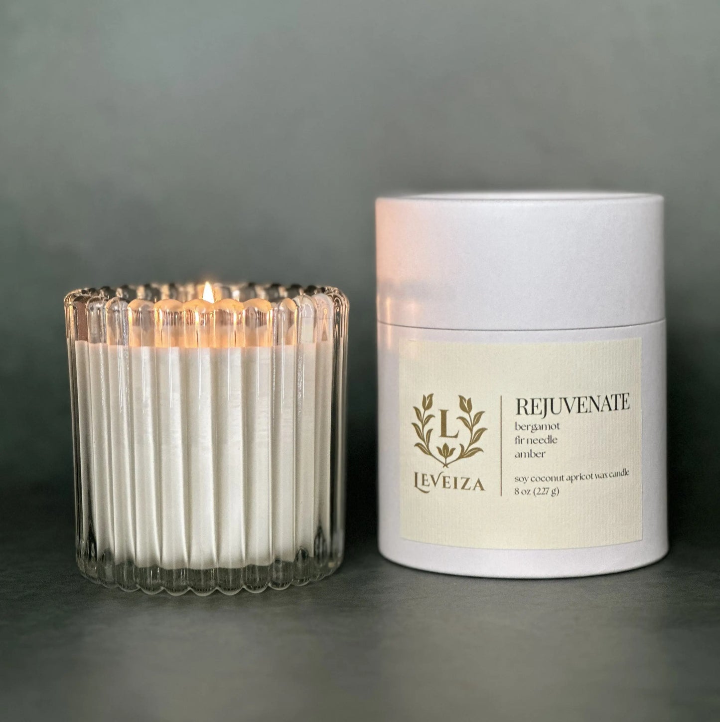 Rejuvenate luxury soy candle with white tube packaging by Leveiza